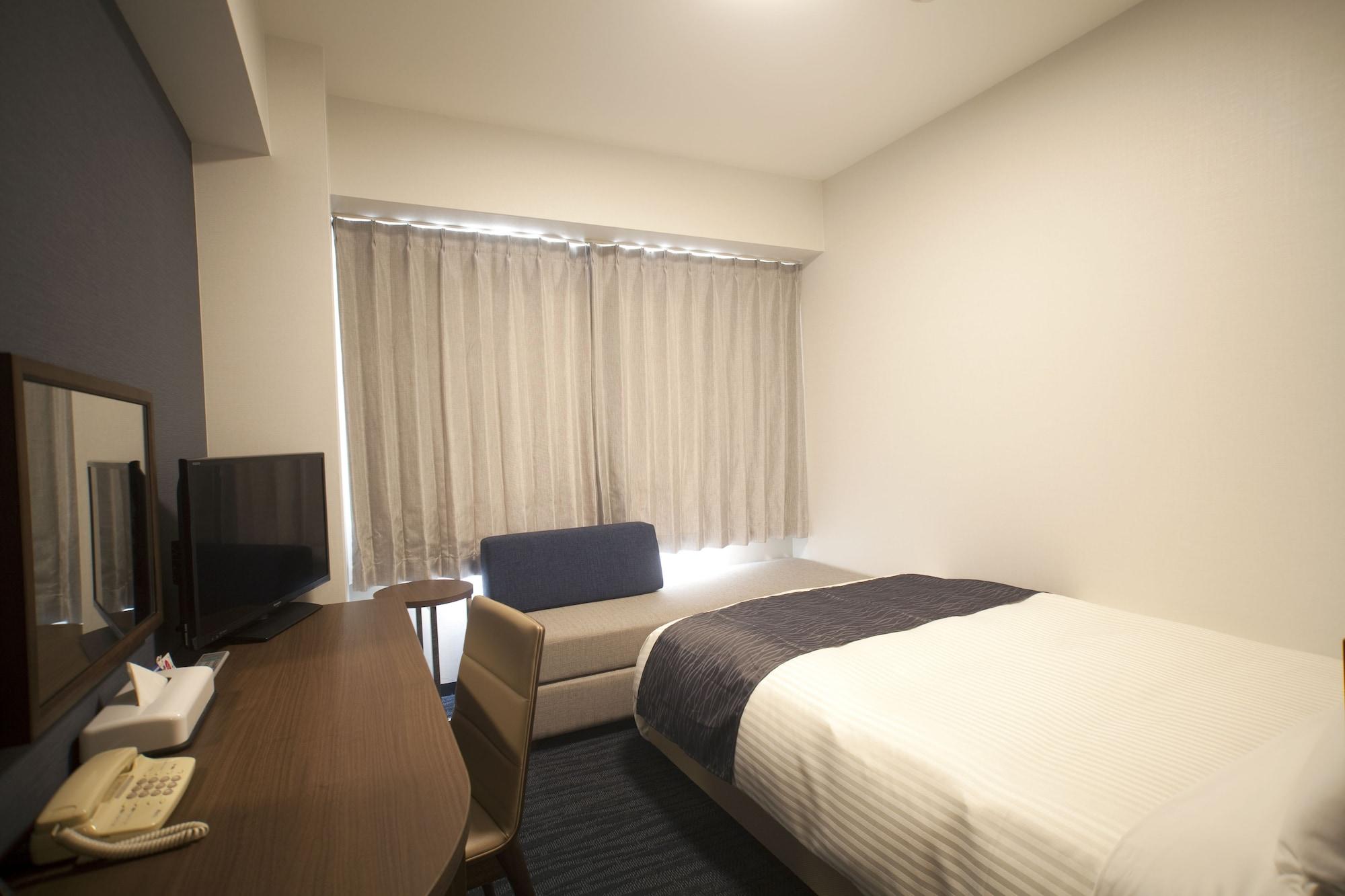 Hotel Port Plaza Тиба Экстерьер фото A single room at a hotel in Japan