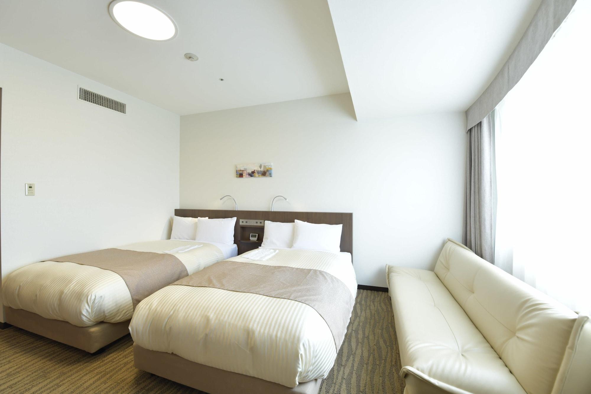 Hotel Port Plaza Тиба Экстерьер фото A room at the hotel