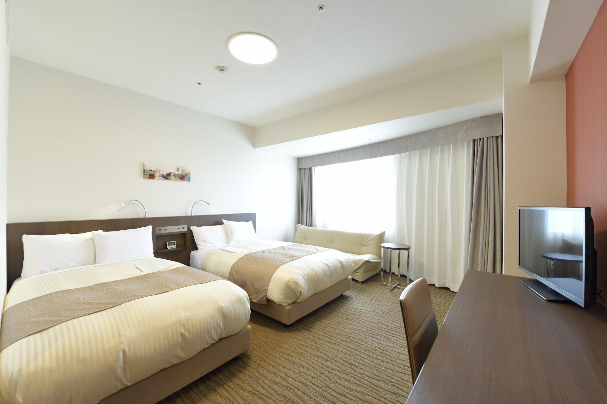 Hotel Port Plaza Тиба Экстерьер фото A room at the hotel